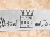 A square of toilet paper with a drawing of a toilet paper factory