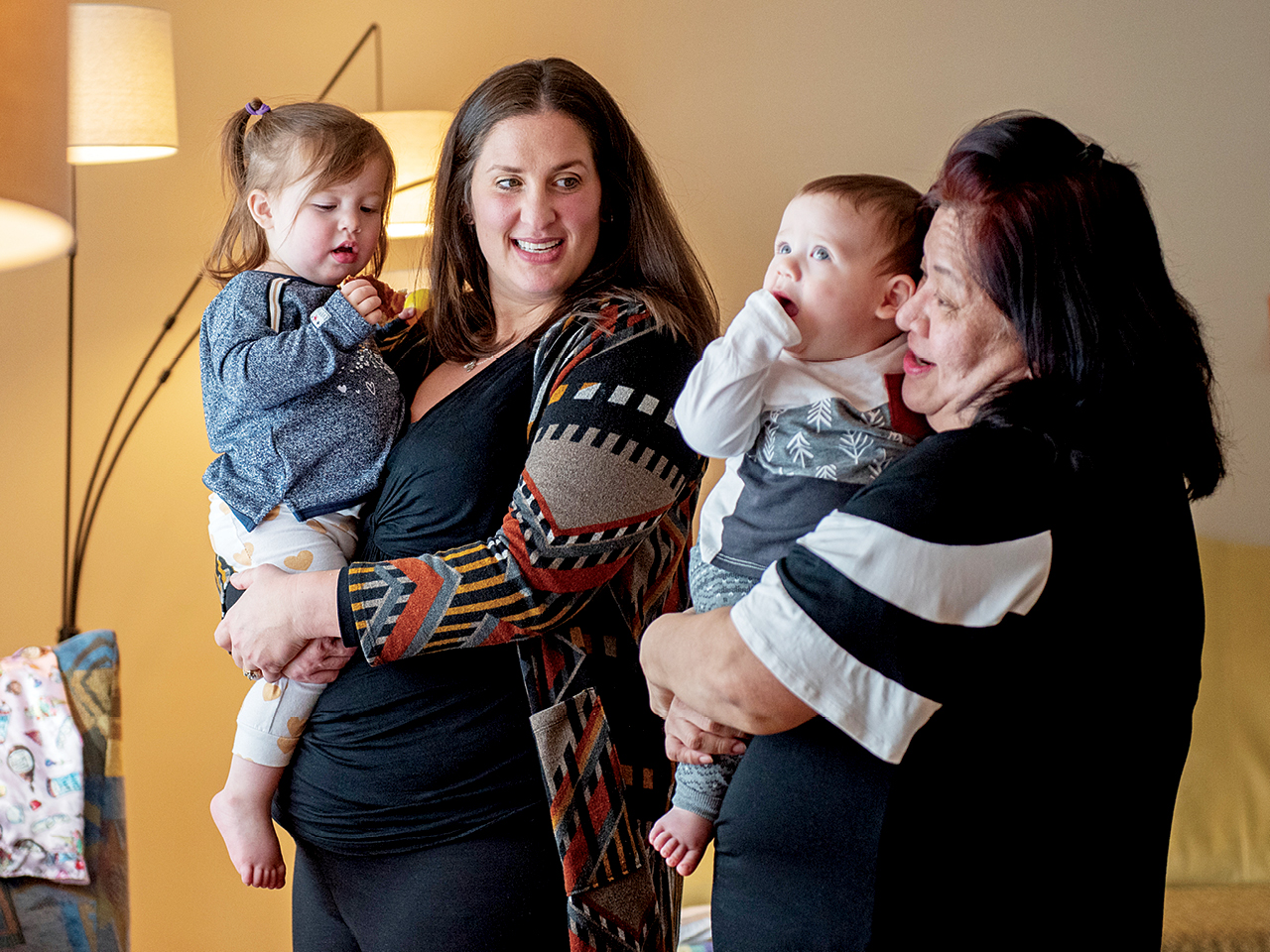 A photo of Naomi Pfeffer with her daughter, Ariella, her son, Reuben and their nanny, Ohrie Sarrondo. 