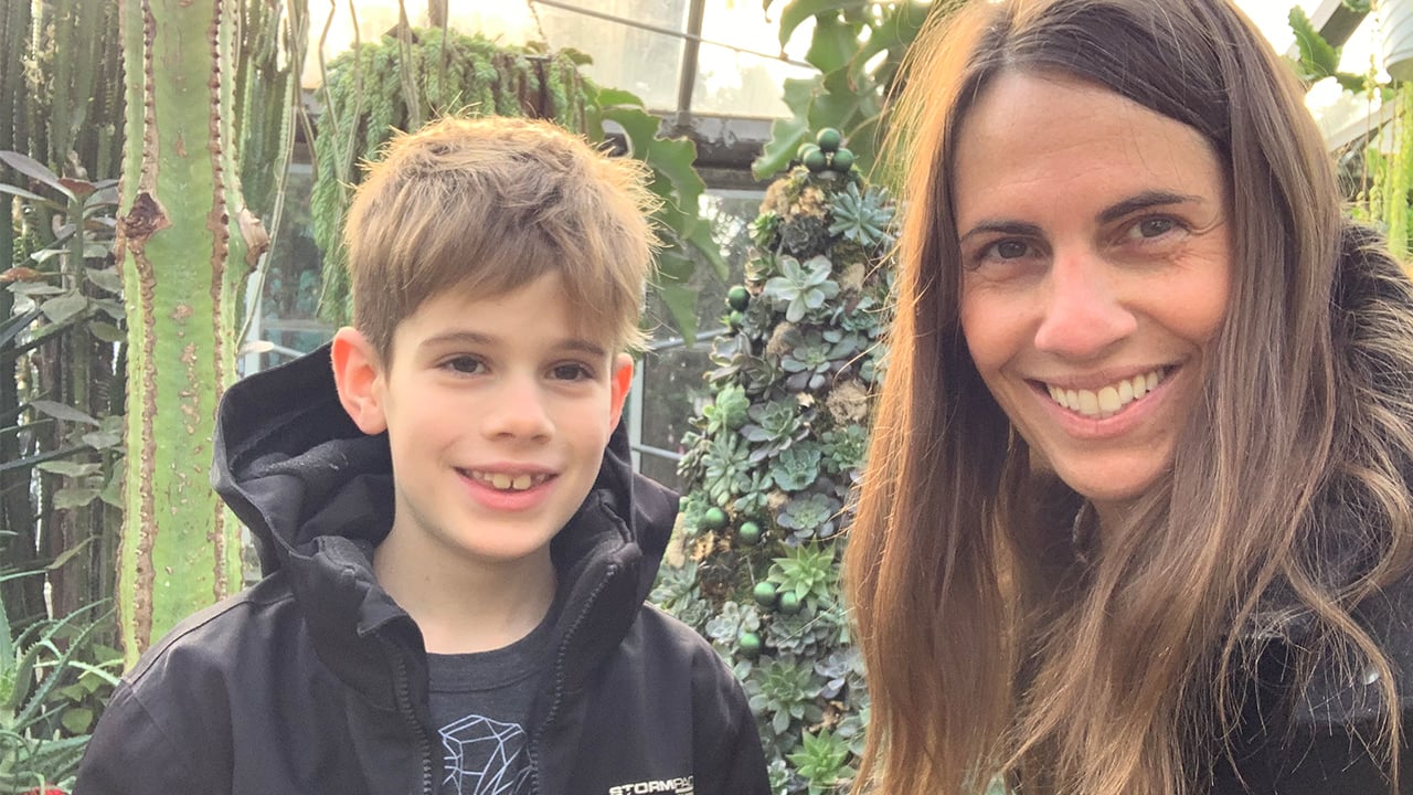 A photo of the author and her son for a piece on why she pulled her child out of e-learning