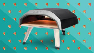 a lit pizza oven with pizza emojis in the background