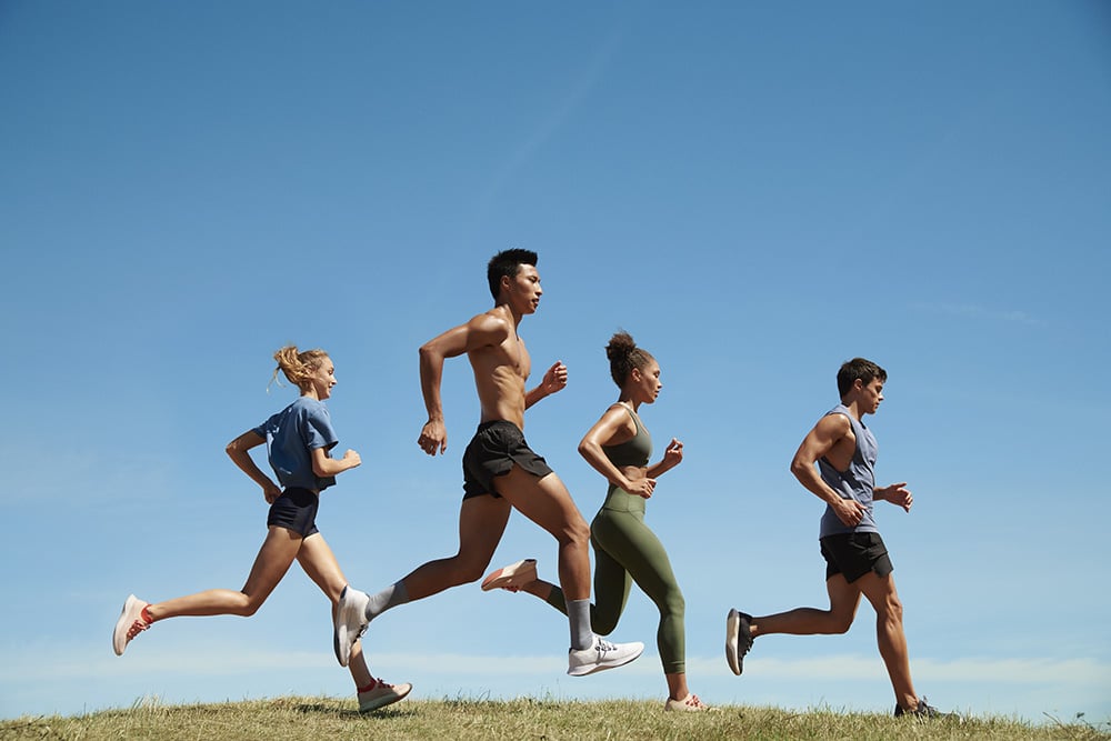 A group of runners wearing Allbirds' new running shoe, the Tree Dashers