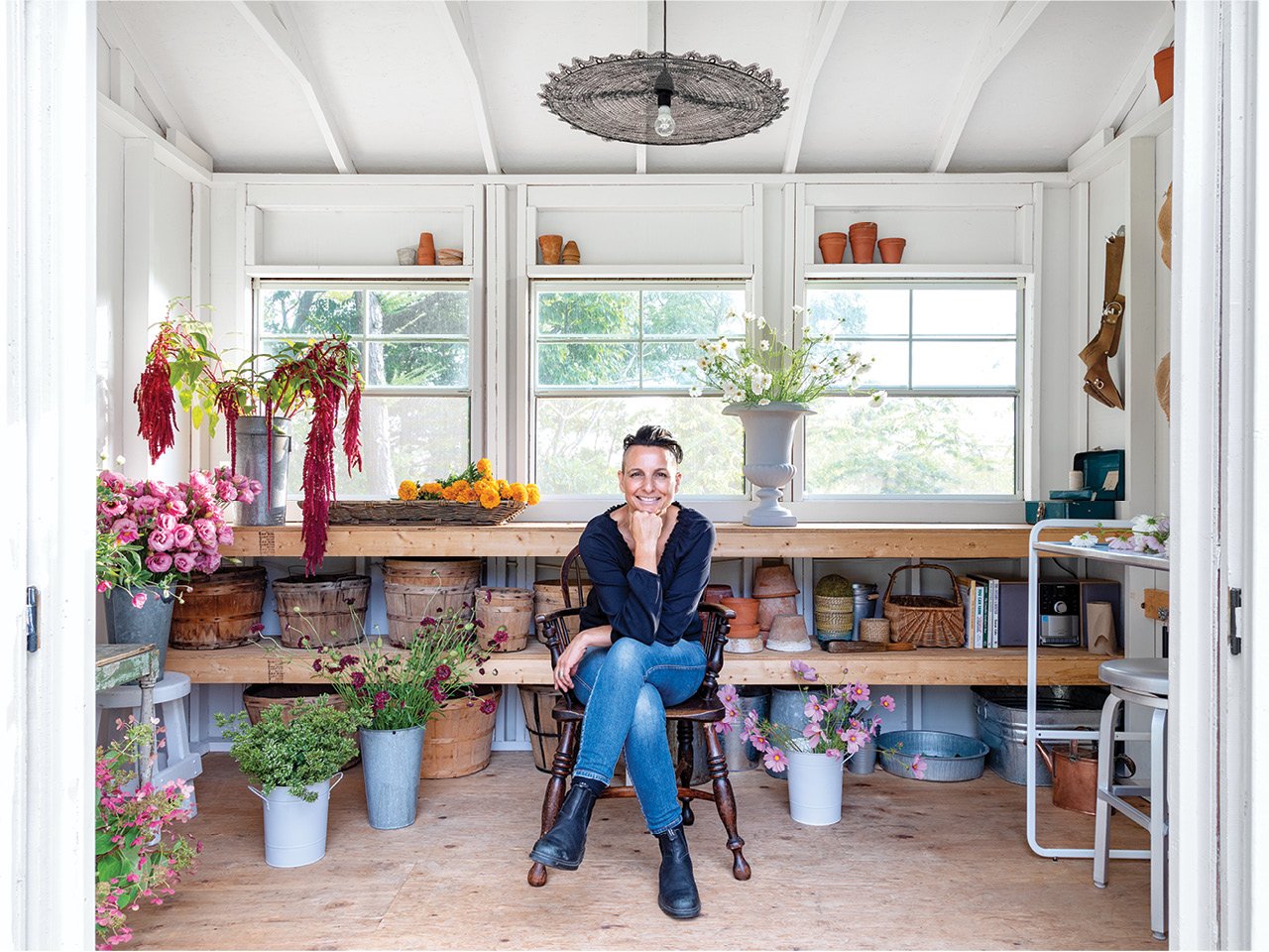 Floral designer Cynthia Zamaria in the potting shed adjacent to her cutting garden.