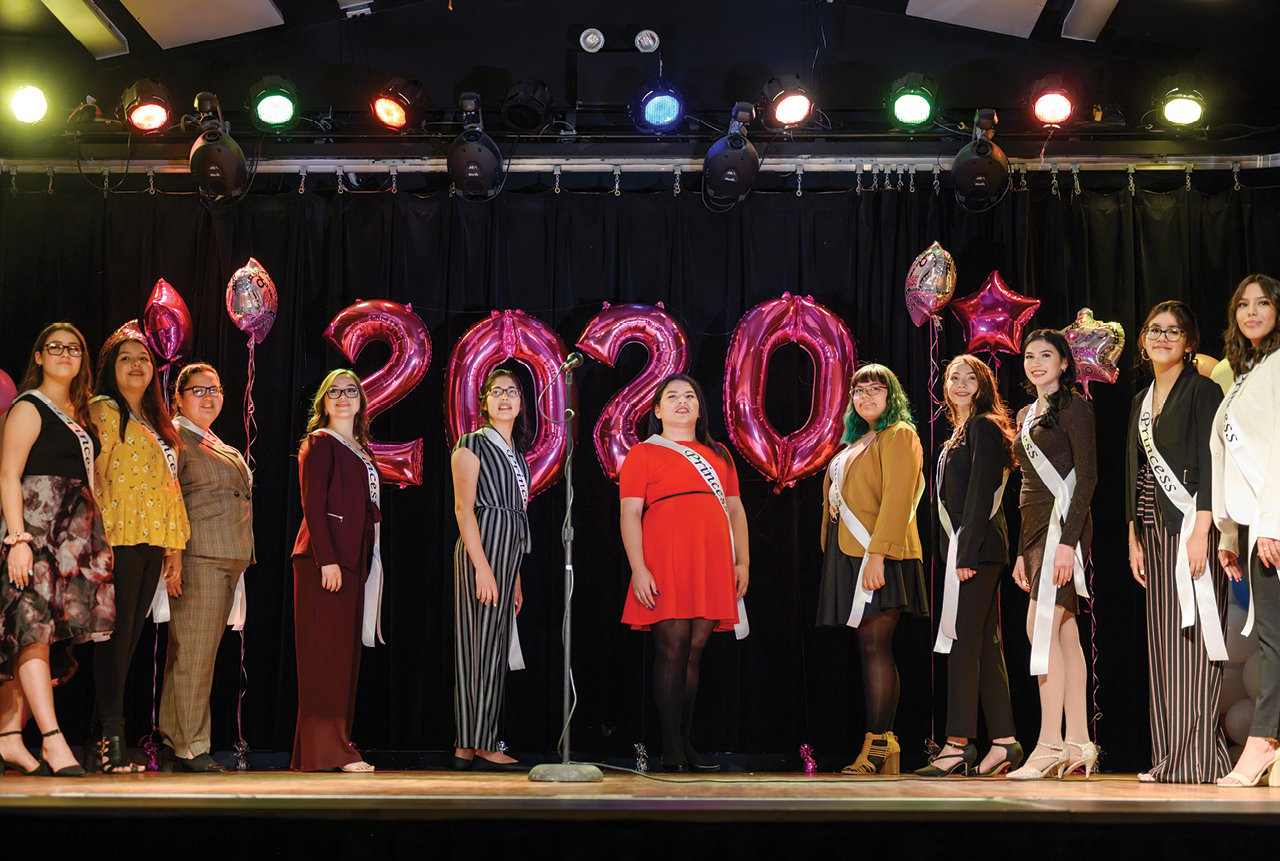 The 2020 Oqnali'kiaq Princess Pageant contestants pose on stage.