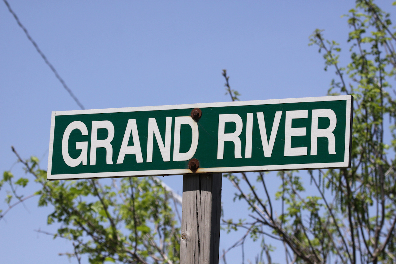 A sign for the Grand River. The Grand River runs through southern Ontario, Canada.