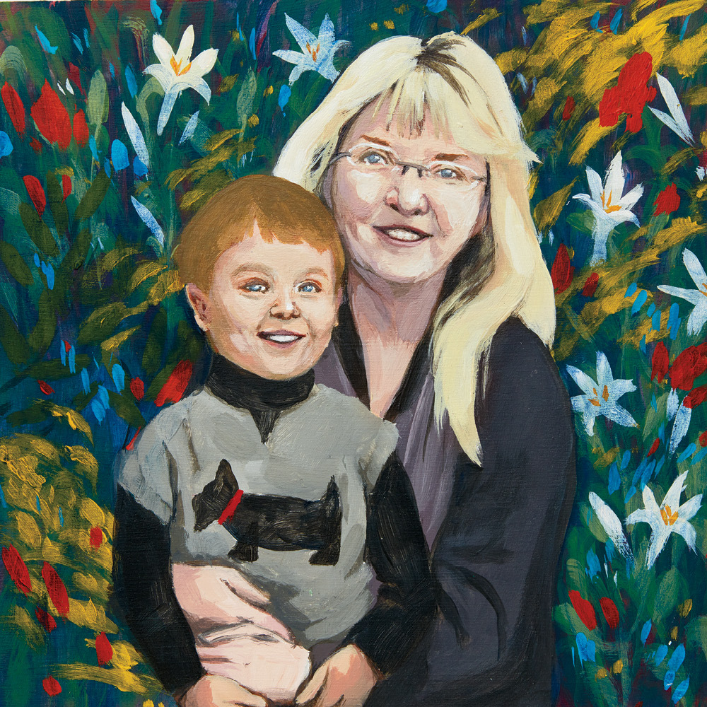 A portrait of a blonde woman with her young son