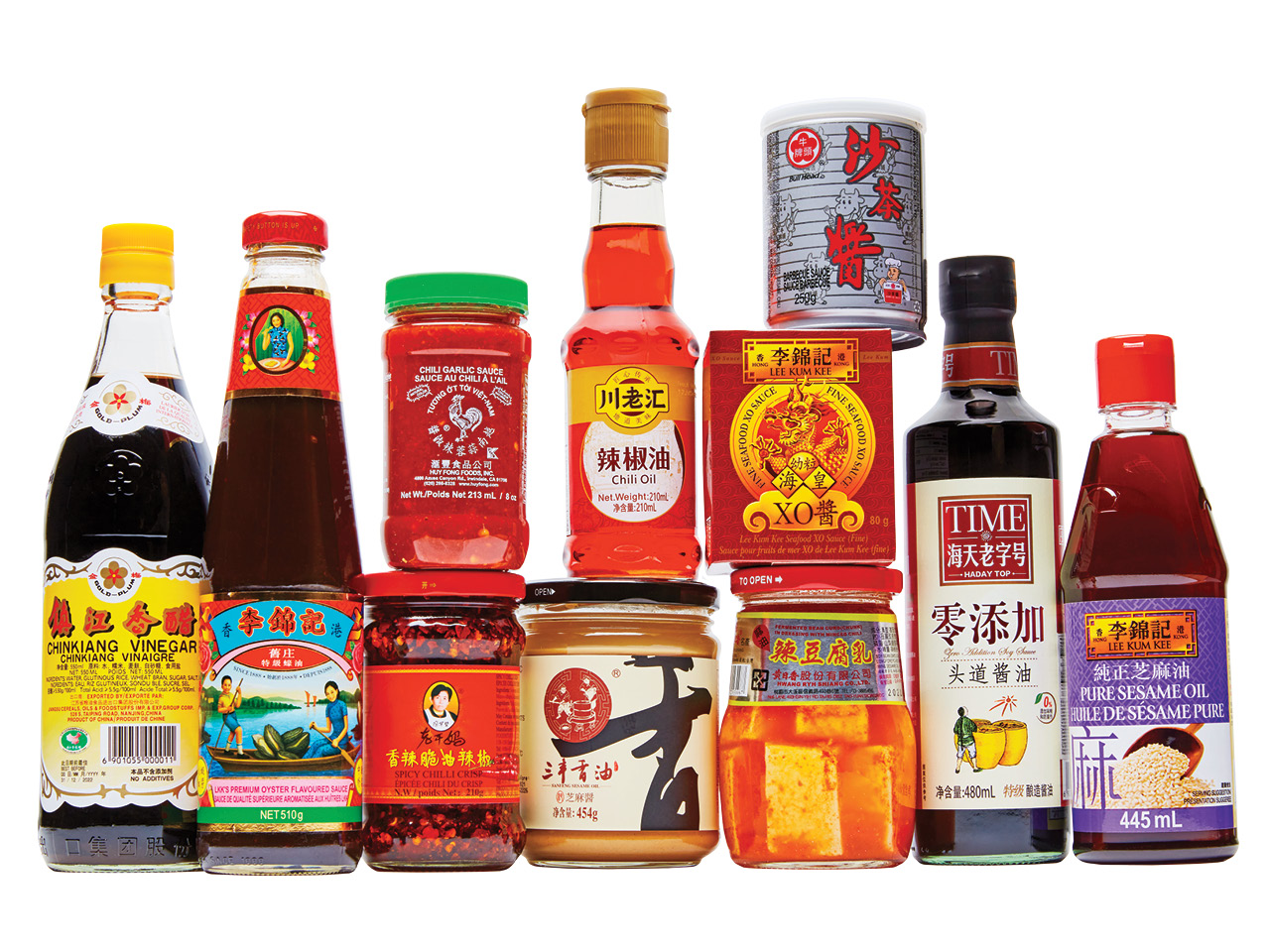 an assortment of hot sauce and vinegar bottles