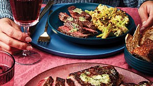 Steak with Garlic-Herb Butter and Roasted Parmesan Caulilini