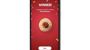 Phone screen with Tim Hortons app open, with a message that says, "Winner!"