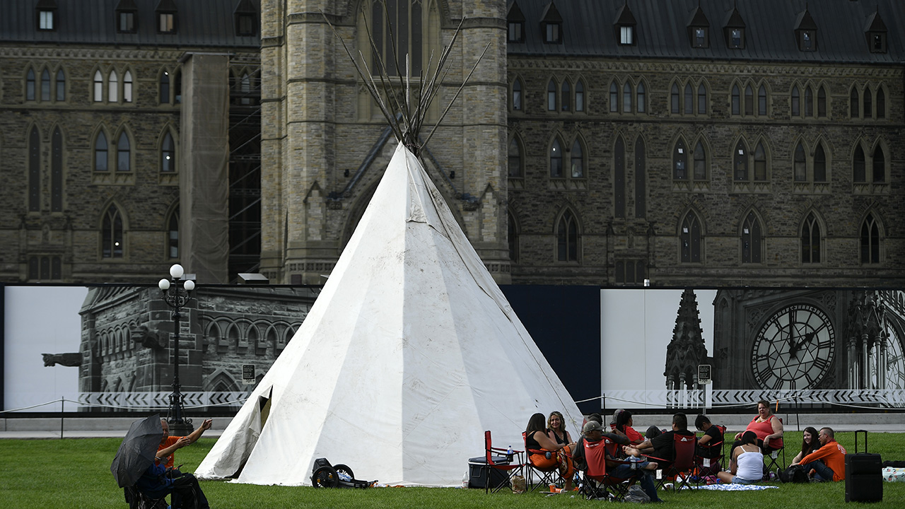 A teepee set up on the lawn of Parliament Hill to receive walkers of Blinding Light Walk - Tiger Lily, who walked from Sudbury to Ottawa to call for changes to the Indian Act, in Ottawa, on Thursday, Aug. 19, 2021. (Photo: The Canadian Press / Justin Tang)
