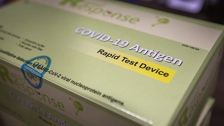 Rapid response COVID-19 antigen test devices pictured in Kingston, Ont. on Dec. 10, 2021. (Lars Hagberg/CP)