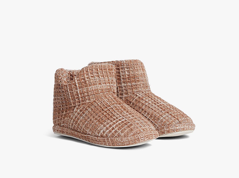 A picture of a pair of brown waffle booties from Parachute for a round-up of the best slippers for winter.