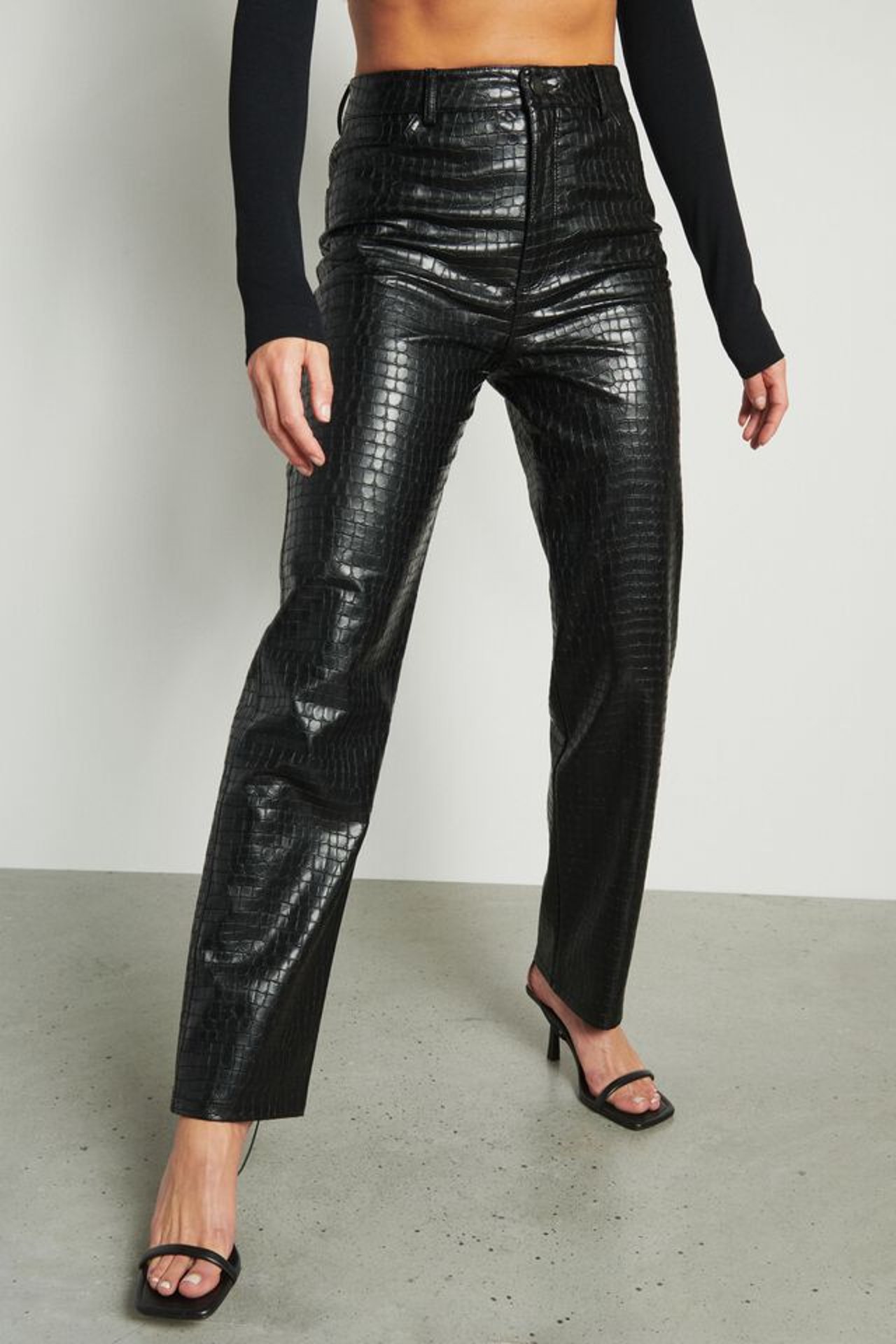Black leather pants with texture 