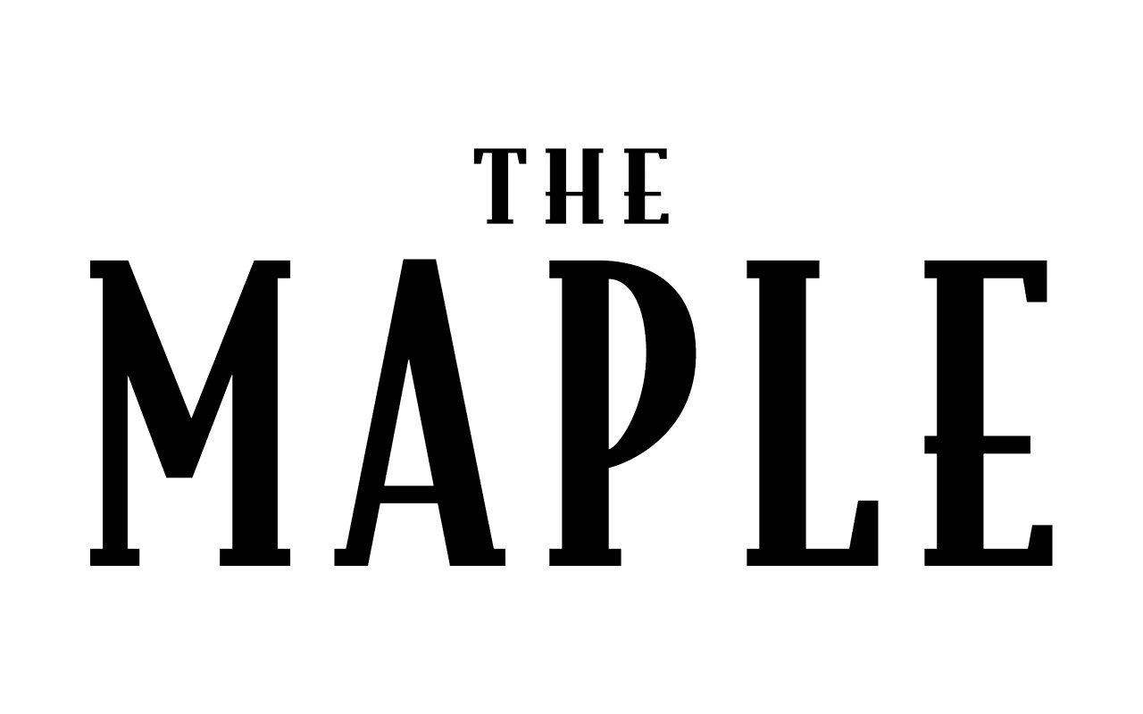 All-caps text that reads "The Maple"