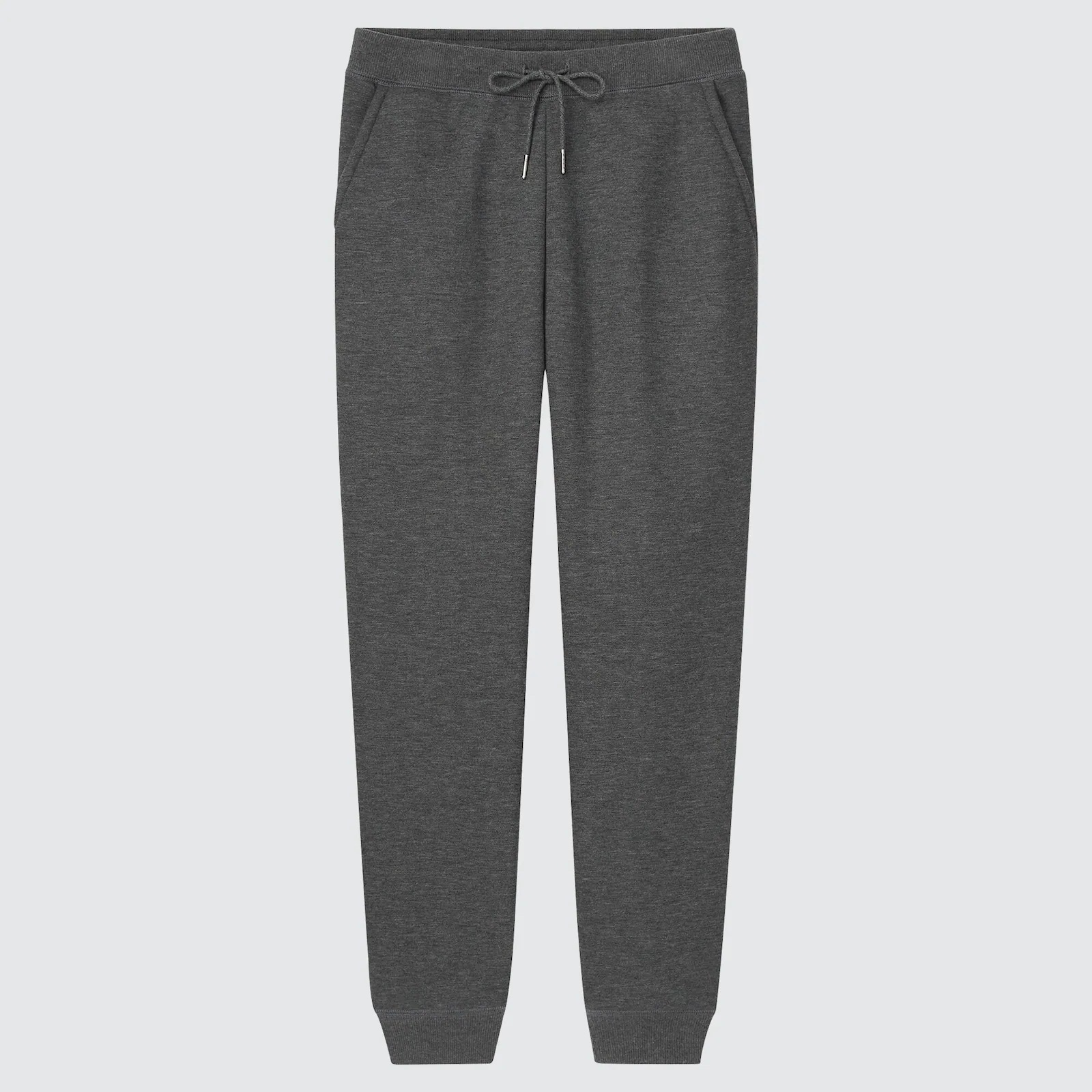 Dark grey sweatpants on a grey background