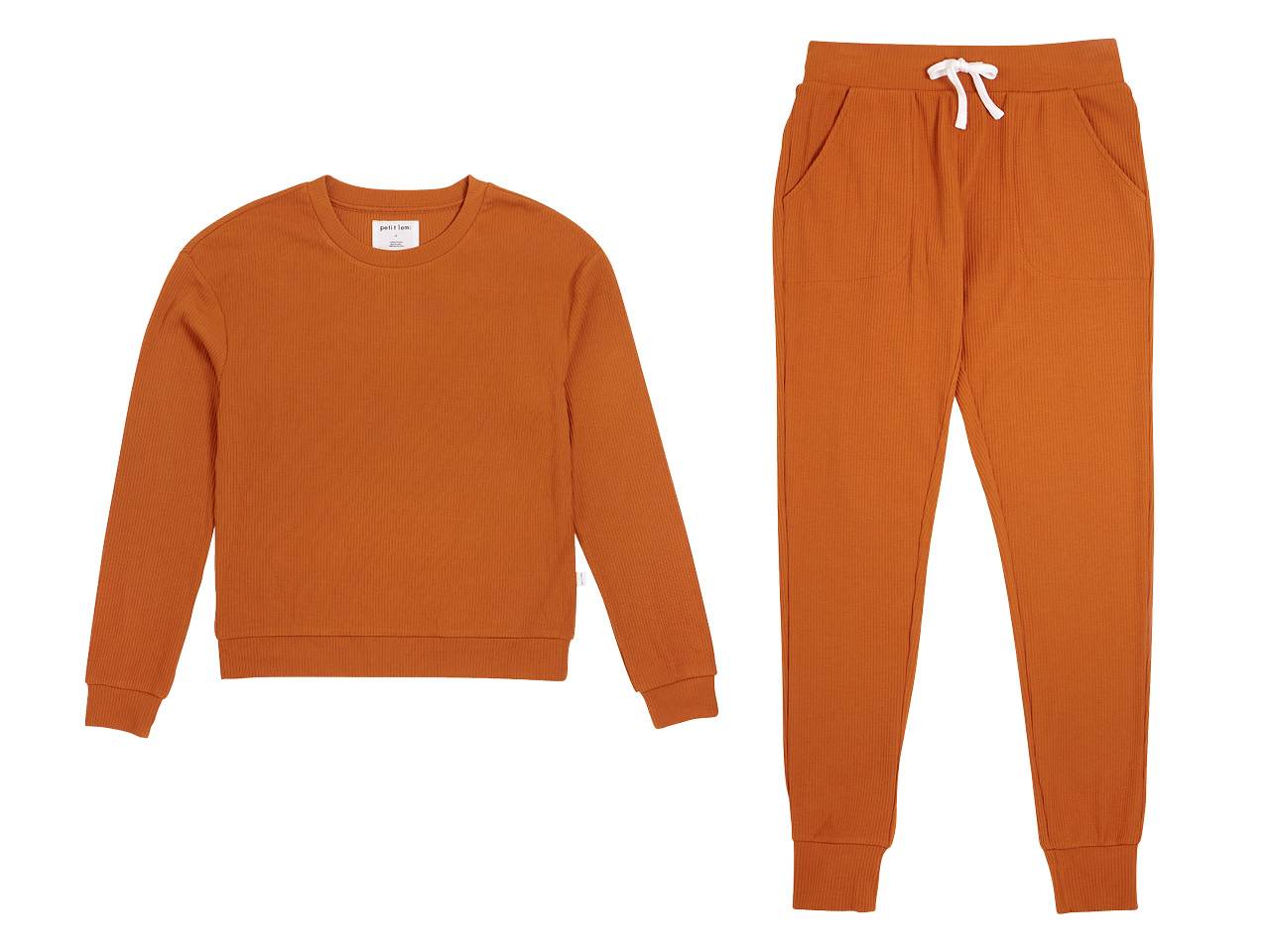 Matching burnt orange long sleeve top and bottom pyjamas.