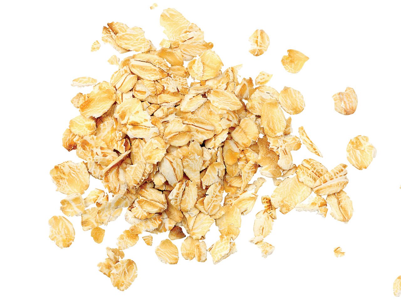 A small pile of rolled oats against a white background