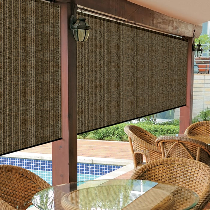 Photo of a deck that has an outdoor roller blind pulled down for privacy