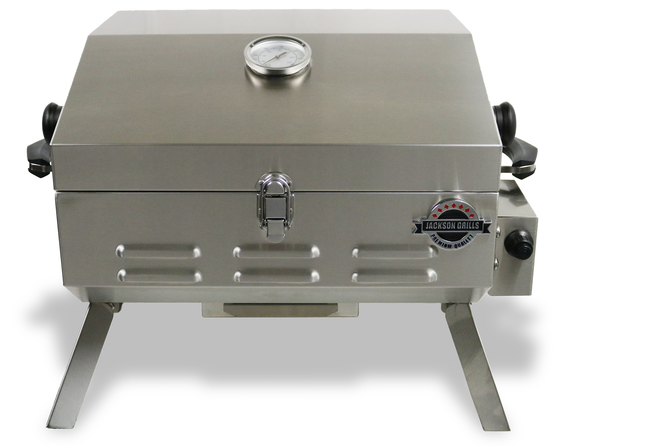 Small silver tabletop barbecue with short legs.
