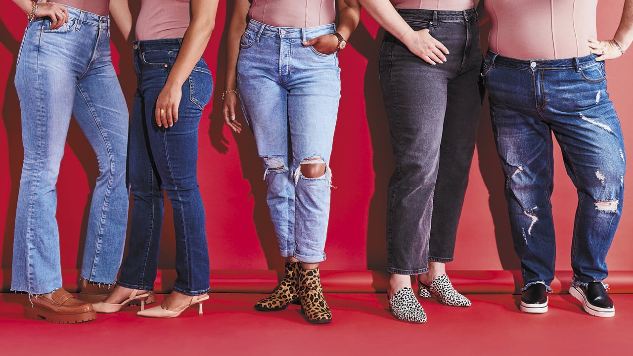 Five models of different body types trying on the best jeans for women photographed together wearing denim.