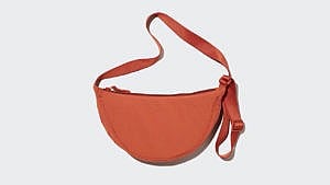 A photo of the Uniqlo Moon Bag in orange, which is now available in Canada.