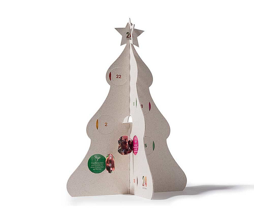 A Christmas-tree shaped cardboard charitable advent calendar by 24 Good Deeds.