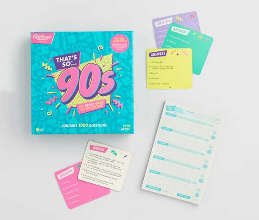 Box and papers from That’s So '90s trivia game by Ridley's Games.