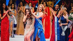 Emma Morrison is crowned by Miss World Canada 2021 Jaime VanDenBerg. Morrison is the first Indigenous Miss World Canada.